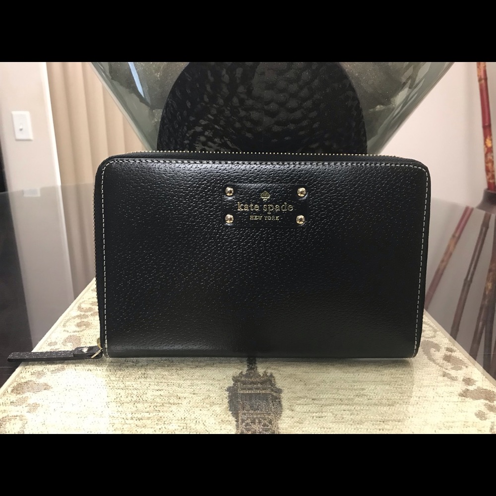Kate Spade leather travel zip wallet.